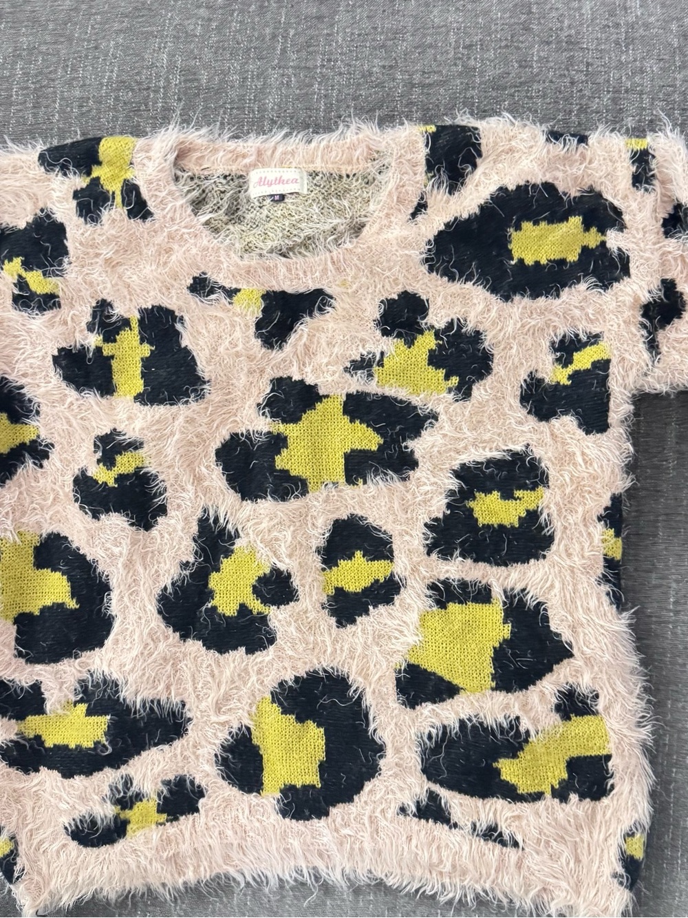 Alythea Pink Fuzzy Leopard Print Sweater with Black and Yellow Spots